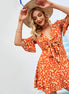 Robe Bohème Florale – Col V & Nœud Élégant